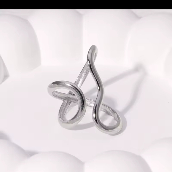 Modern Silver Infinity Ring with Abstract Design - Picture 1 of 7